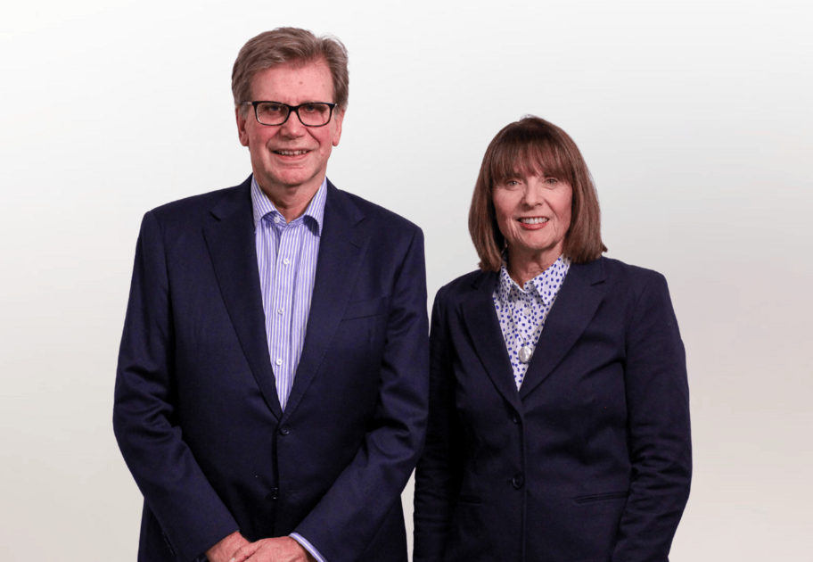 Portrait of Mission Australia Chairman, Ian Hammond standing together with Mission Australia CEO, Sharon Callister.