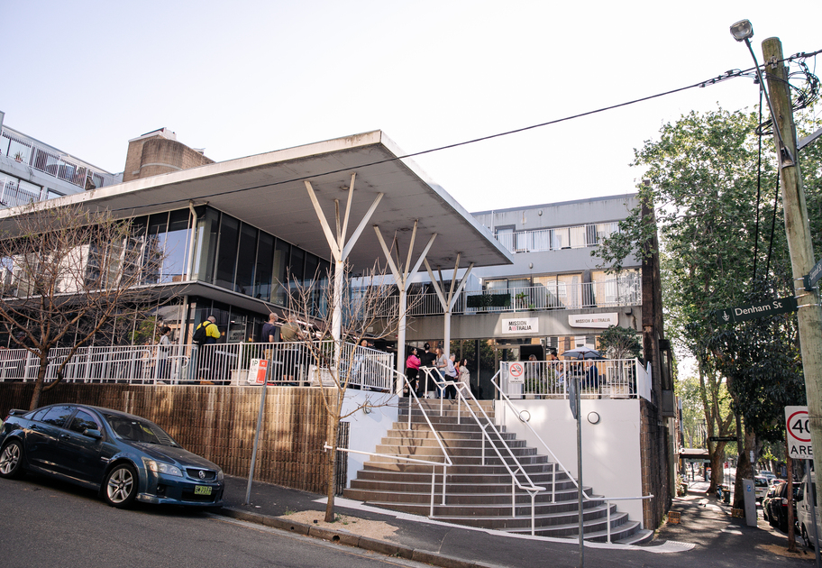 Wide-angle view of the Mission Australia Centre Surry Hills building and front signage.